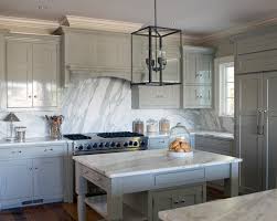 Calcatta verona quartz with grey & white cabinetry. Curved Kitchen Counters Design Ideas