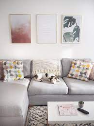 Gray rooms are a great way to start refreshing your home decor. Living Room Tour Pink Grey Gold Decor Bang On Style