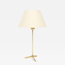 Desk lamps pick up where the sun leaves off providing the light you need for reading, writing, studying and keeping track of things whether your desk is in a corporate office, a dorm room, a home office or your den. Tripod Brass Table Lamp From Germany 60s