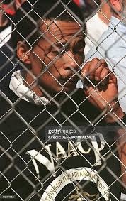Darrell Nichols, president of Northwest Ohio NAACP, wipes a tear from...  News Photo