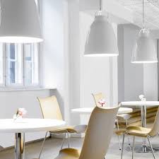 Crafted from metal in a versatile solid finish, this light fixture features a rectangular canopy and three adjustable hanging cords that hold a trio of spherical glass shades with openings along the bottom. Dining Room Pendant Lighting Ideas How To S Advice At Lumens Com