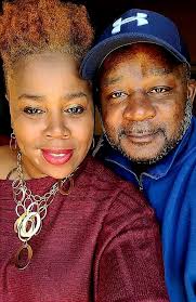 Married couple shares quiet moment with coffee and conversation