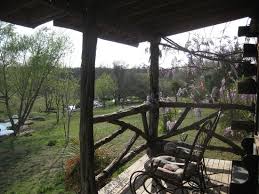 The inn on barons creek is a renowned fredericksburg tx hotel in the heart of texas hill country. Lucerne Cabin Porch With Fragrant Wisteria Picture Of Barons Creekside Cabin Resort Fredericksburg Tripadvisor