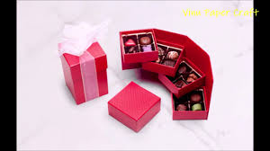 If you are feeling exceptionally crafty, make a tiny box that holds the recipient's present and attach it to the center of the box. How To Make A Paper Tower Gift Box Greeting Card Small Business Ideas For Women Youtube