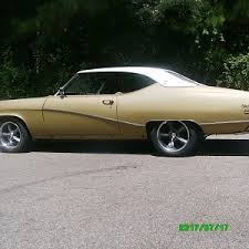 Image result for Trumpet Gold 1969 Buick