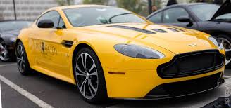 Image result for New Yellow 2016 Aston Martin
