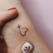 Get this tattoo design done on the wrist of yours and your partners. 90 Simple Wrist Tattoo Designs For Girl Cool Tattoo Cute Little Tattoos Small Tattoos Tiny Tattoos