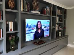 Organise Your Home With A Bespoke Media Storage Unit Living Room Wall Units Living Room Tv Living Room Tv Wall