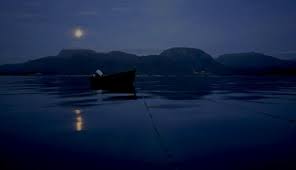 Boat in the middle of the ocean at night. Boat At Night On The Sea Night Sea Old Boats Sea