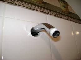 How To Fix A Shower Leak Behind The Wall Bathroom Shower Walls Shower Plumbing Shower Wall