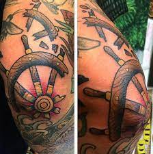 Good Elbow Tattoos For Gentlemen Of Broken Ship Wheel Elbow Tattoos Traditional Tattoo Elbow Ship Wheel Tattoo