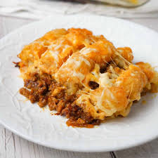 Then, add pork, beans, condensed cream of chicken, tomatoes, chilies, brown rice, water, salsa, and cumin into it. Dr Pepper Pork Tater Tot Casserole This Is Not Diet Food