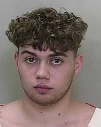 21-year-old NATHAN ACKLEY from OCALA was booked