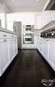 Dark wood is not something new for kitchen furniture and also the dining table. Shea Mcgee Design Floors And Cabinet Detail Jpg 700 1 103 Pixels Wood Floor Kitchen Dark Wood Kitchens Hardwood Floors Dark