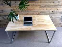 Longer tables work best because the plywood has something to rest on, rather than floating in waterproofing your table will prevent the plywood from becoming damaged if beer or other liquids get spilled on your table. Diy Plywood Desk With Pipe Frame Plans To Build Your Own Simplified Building