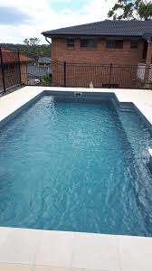 A Compass Pools Vogue Install In Evolution From The Bi Luminite Range Of Colours Pool Colors Pool Fiberglass Swimming Pools