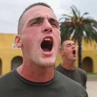 Culinary Specialist 2nd Class Eleazar Sison plays “kendama”