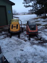 Image result for Orange 1973 Snowmobile