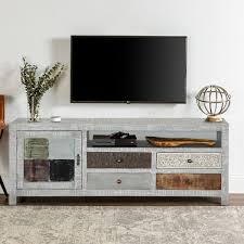 Use one to maintain a sleek aesthetic in the living room. Mexico Sleek Mango Wood 4 Drawers Accent Media Console
