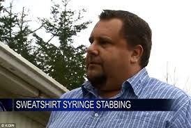 Son pricks his finger