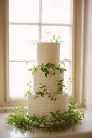 Organic Green Wedding Decor With Vines Ivy Or Olive Branches Mywedding Botanical Wedding Cake Botanical Wedding Tiered Wedding Cake