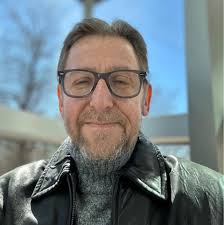 Great shot of Randy Rhoads being picked by Ozzy Osbourne during a show In  1982