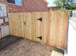 Warning and stop signs, under construction boards, yellow tape and cone. Build A Wooden Fence And Gate 13 Steps With Pictures Instructables