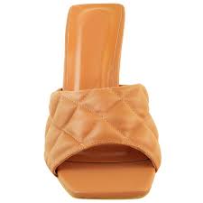 Pair amane slip on heels with your favorite pair of skinny jeans to elevate your casual look or with maxi skirt indulge in these divine leather amane mules. Kelsey Camel Quilted Heeled Mules Envy Shoes Uk