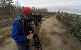The kpix 5 crew was outside their news van when a car pulled up. Camera Crew Vienna Austria Video Crew Hire
