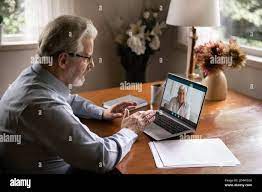 Mature men have pleasant webcam video call Stock Photo - Alamy