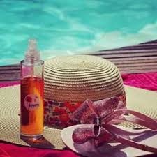 Huile Bronzante Visage Corps Liberty Et Bottes De Pluie Visage Corps Huile