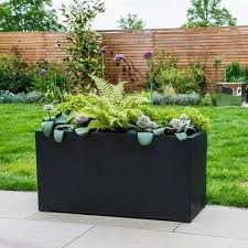 Large garden planters ready made, trough planters in wood, 1.8m, 1.45m and 1.00m long for gardens, allotments and easy gardening. Fibreglass Trough Planters Caragh Nurseries