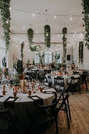 Plants Galore At This Charmingly Quirky Wedding Reception Image By Linda Lauva Photography Used Wedding Decor Quirky Wedding Wedding Plants