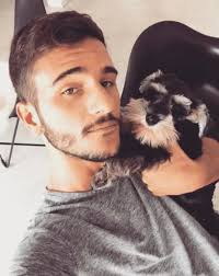 A lo Macri, Peter Robledo va a trabajar con Horacio, su perro schnauzer