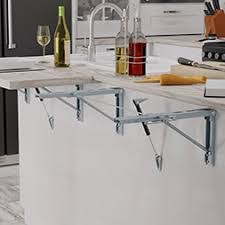 This ergonomic desk swings into action to create a temporary lightweight desk space, soon to be the epicenter for epic. Wall Mounted Folding Tables Brackets Ironing Boards Countertops