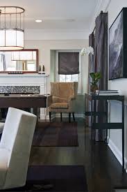 Black furniture is classic, it's a great vehicle to make color stand out. Decorating Arund Dark Floors