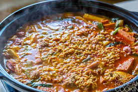 Flank steak sits overnight in a sweet marinade before being grilled to perfection. Budae Jjigae Army Stew Crazy Korean Cooking