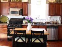 By extending the subway tiles to the top of the room. 38 Decorating Cabinet Tops Ideas Above Kitchen Cabinets Decorating Above Kitchen Cabinets Kitchen Cabinets Decor