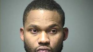 Man faces charges after brandishing machete, police say