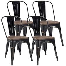 With this set of two metallic dining chairs from dhp, you'll have everything you need to relax in enjoy your meal. Jummico Metal Dining Chair Stackable Industrial Vintage Kitchen Chairs Indoor Outdoor Bistro Cafe Side Chairs With Back And Wooden Seat Set Of 4 Gold Black Buy Online In Antigua And Barbuda At Antigua Desertcart Com
