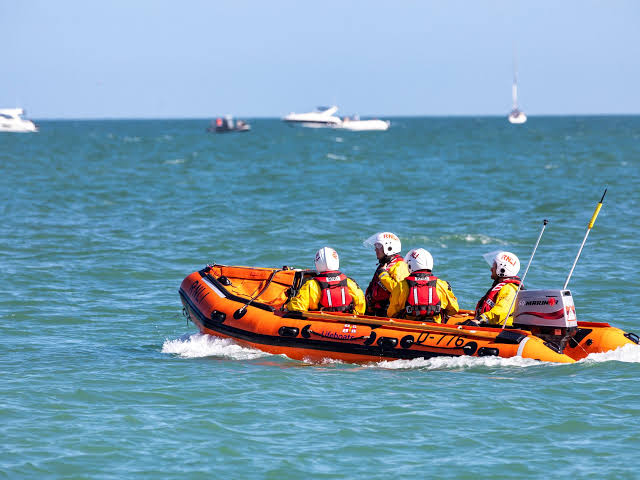 Mega-dinghy carrying 157 migrants catches fire while attempting to cross  the Channel