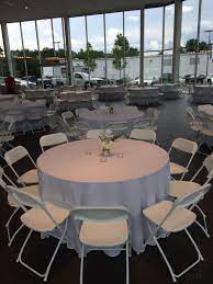 White Hercules Chairs And 60 Round Tables At The Jim Ellis Audi Atlanta Showroom Party E Table Linen Rentals Outdoor Furniture Sets Corporate Event Planner