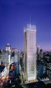 A system of small ceramic tubes covering transparent glass which permit the tubes to show the color of the sky. New York Architecture Images Times Tower