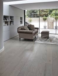 We place great emphasis on being able to offer our customers the best possible advice and that our products are installed and used 100% correctly. Junckers Oak Silver Pearl Solid Wide Board Floor Junckers Woodflooring Solidhardwood Woodenfloors Grey Gray Gr Gray Oak Floor Grey Wooden Floor Flooring