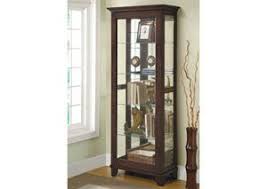 The base contains a drawer for storage. Curio Cabinet Category Home Accents Curio Cabinet 25 Html Coaster Furniture Furniture China Cabinet