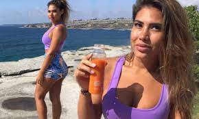 The Bachelor's Noni Janur holds juice while suffering nip slip in busty  crop top | Daily Mail Online