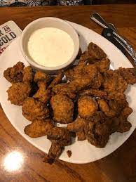 Roasted garlic filet mignon medallions Steakhouse Mac And Cheese Bites Very Little Flavor In My Opinion Picture Of Outback Steakhouse Chicago Tripadvisor