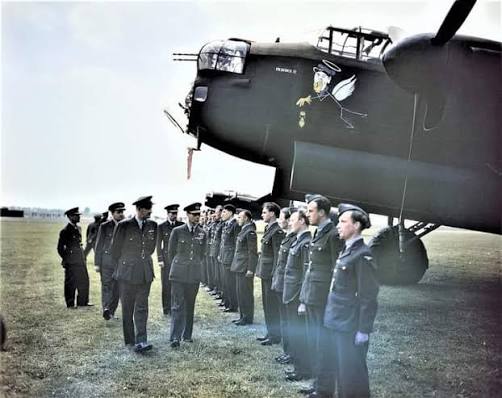On 27 May 1943, HM King George VI is pictured visiting No. 617 Squadron  (The Dambusters) at Royal Air Force Scampton in Lincolnshire. The King has  a word with Flight Lieutenant Les