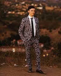 Floral pattern posing suits for men. 21 Grooms Who Wore Colorful Wedding Suits Martha Stewart