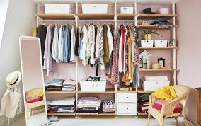 With that, you can sit while putting shoes on or while looking for the perfect accessories from the drawers in that tufted ottoman looks really nice as well. 15 Stylish Walk In Closet Ideas For Even The Smallest Of Bedrooms Real Homes